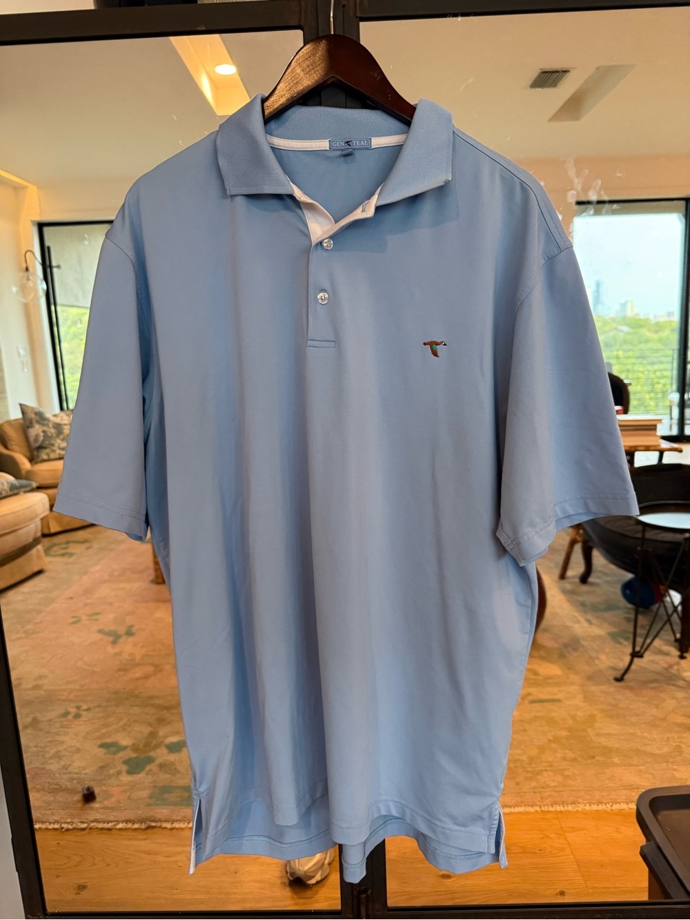 Men's Light Blue Polo with Subtle Chest Logo